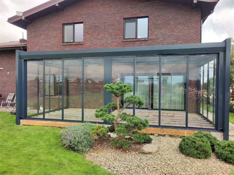 glass room with wooden floor